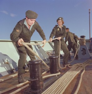 MS Pierre Gendron and Cpl. S. Thompson, Supply Tech, HMCS Cormorant. MS Gendron makes a turn on the bollards while Cpl. Thompson handles the slack line. Photo Courtesy RCN DHist.