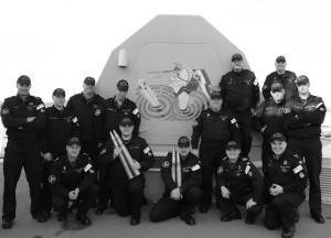 Sailors from HMCS REGINA (2nd display the updated version of their frigates Gunshield Art. Photo courtesy For Posterity's Sake.