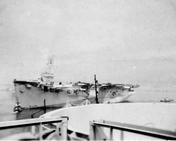 HMS NABOB taken from HMS PUNCHER at Vancouver while both escort aircraft carriers were completing in February 1943. PUNCHER (foreground) is in the builders hands, just starting conversion to RN standards, while NABOB is undergoing trials in preparation for going into service.

NABOB and PUNCHER retained there HMS designation even though they were manned by Canadian sailors and under control of the RCN, both ships are considered to be the first aircraft carriers to serve in the Canadian Navy.

Roger Litwiller Collection, courtesy Howard Abbott, RCNVR. (RTL-HA090)