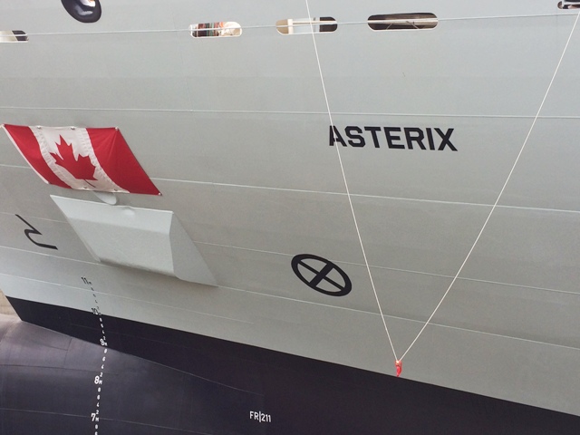 Painted in bold black letters, Asterix's name stands out on the ship side grey hull.  Roger Litwiller Collection, courtesy Roger Litwiller. (IMG_3014)