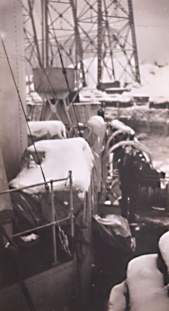 Quebec City is hit by a early winter storm, blanketing HMCS TRENTONIAN in snow, in December 1943. Due to a construction problem in the corvettes ventilating system, it is as cold in the ship as it is outside.

Roger Litwiller Collection, courtesy Jack Harold, RCNVR. (RTL-JH052)