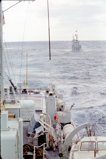 View from HMCS SASKATCHEWAN as HMCS BEACON HILL and HMCS MACKENZIE take up position astern, during a Far East Cruise in 1965. Roger Litwiller Collection, courtesy Brian Rideout. RTL-BR069)