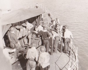 Gun crew on HMCS Cayuga readying to fire the guns. Photo -For Posterity's Sake